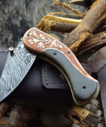 Hand-Forged Damascus Folding Knife with Engraved Copper and Micarta Handle