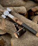 Viking War Hammer (Mjölnir style) with heavy Celtic knotwork engraving, Valknut symbol, and leather-wrapped handle.